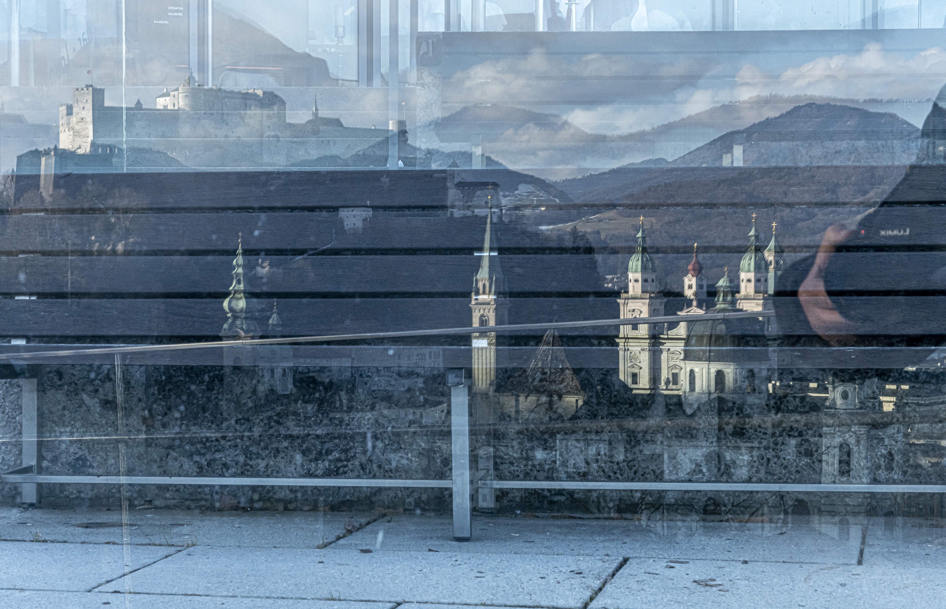 Reflection of Salzburg in a window