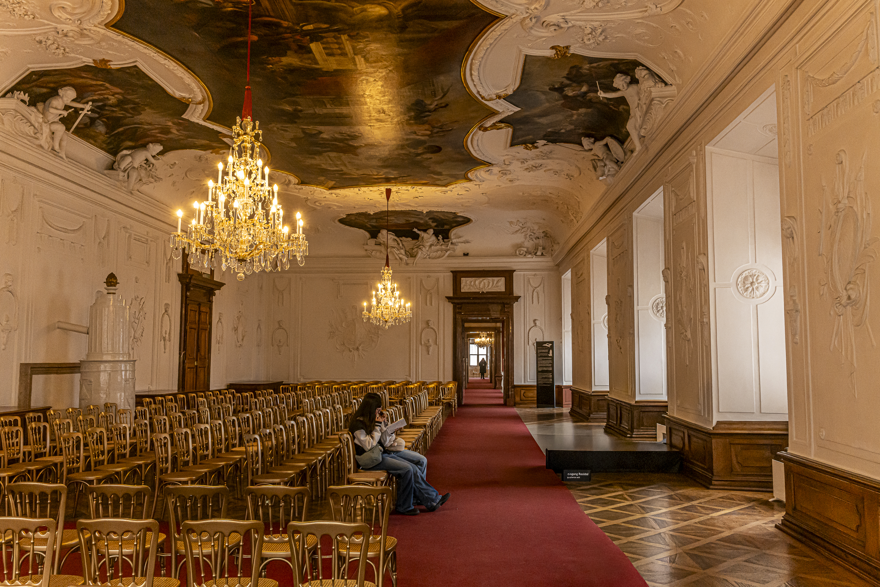 Residenz hall with woman reading